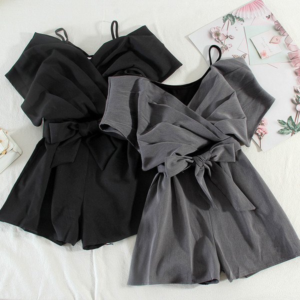 Moderan ženski kombinezon s trakom i tankim naramenicama