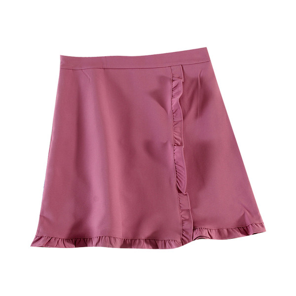 Női lezser rövid szoknya fürtökkel és magas derékkal