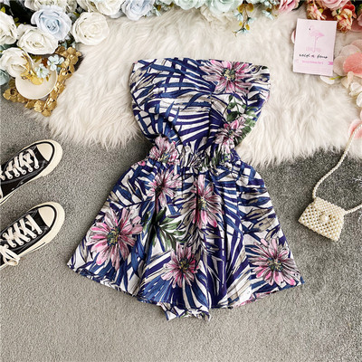 Alkalmi női overál rugalmas derékkal, virágmintával