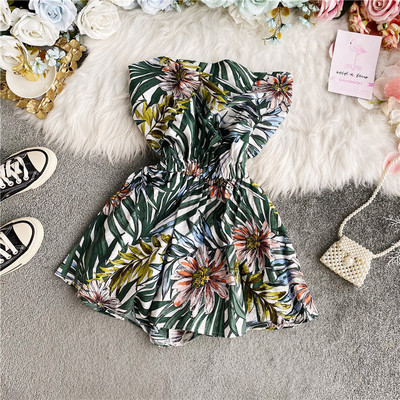 Alkalmi női overál rugalmas derékkal, virágmintával