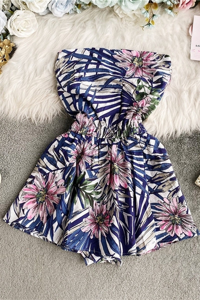 Alkalmi női overál rugalmas derékkal, virágmintával