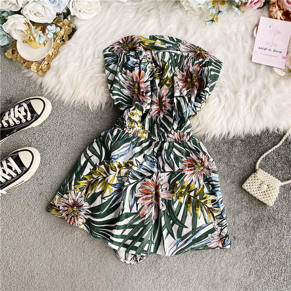 Alkalmi női overál rugalmas derékkal, virágmintával