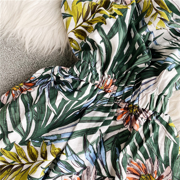 Alkalmi női overál rugalmas derékkal, virágmintával