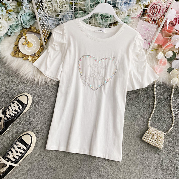 Ženska majica s kamenčićima i ovalnim izrezom