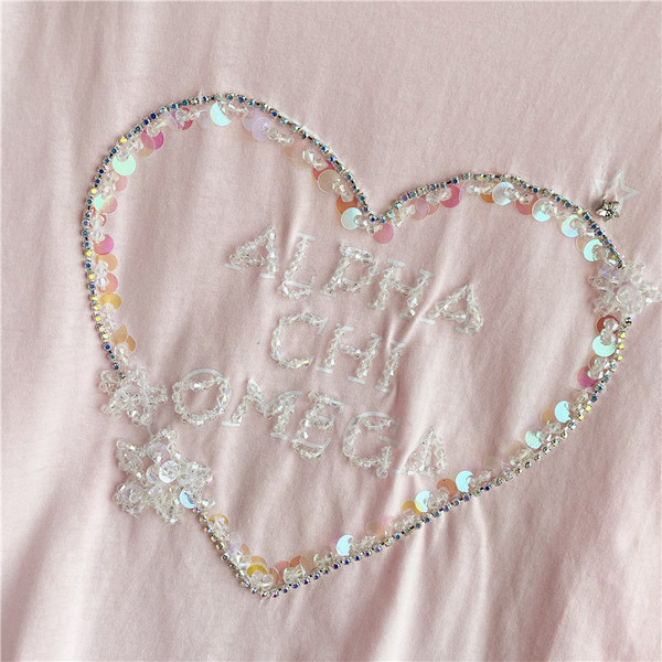 Ženska majica s kamenčićima i ovalnim izrezom