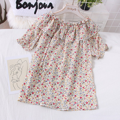 Bluza larga de dama cu decolteu oval si model floral