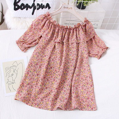 Bluza larga de dama cu decolteu oval si model floral