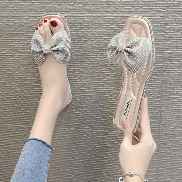 Moderne ženske papuče s trakom i kamenčićima