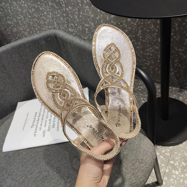 Alkalmi női szandál gumival és kövekkel