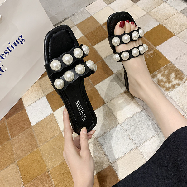 Casual ženske papuče u crnoj boji sa biserima