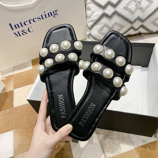 Casual ženske papuče u crnoj boji sa biserima