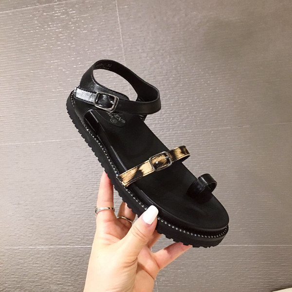 Ženske sandale sa ravnim đonom i kamenčićima u crnoj boji