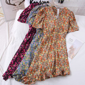 Rochie de dama asimetrica cu decolteu spitz si model floral