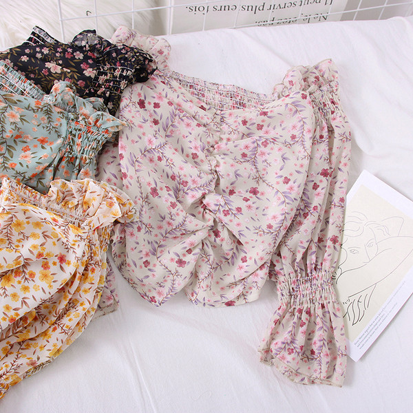 Modern női blúz csónakos nyakkivágással és lótusz ujjakkal