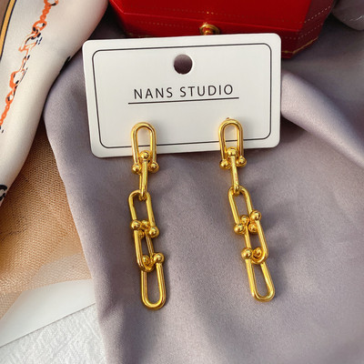 Moderne ženske viseće naušnice u zlatnoj boji