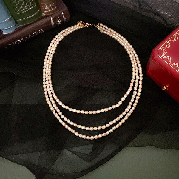 Γυναικείο κολιέ πολλαπλών σειρών με πέρλες