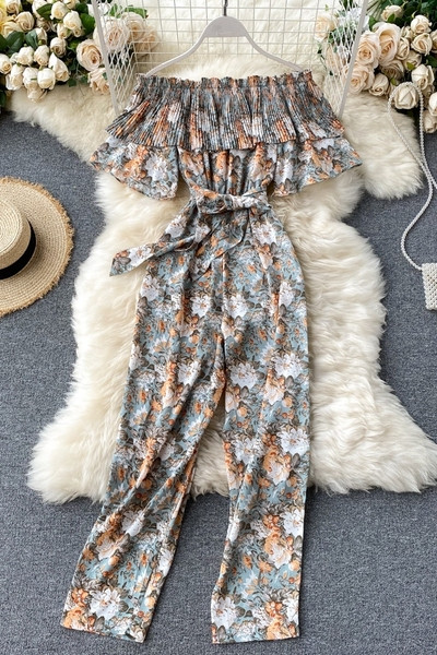 Μακριά γυναικεία ολόσωμη φόρμα με λουλουδάτο μοτίβο και ζώνη μέσης