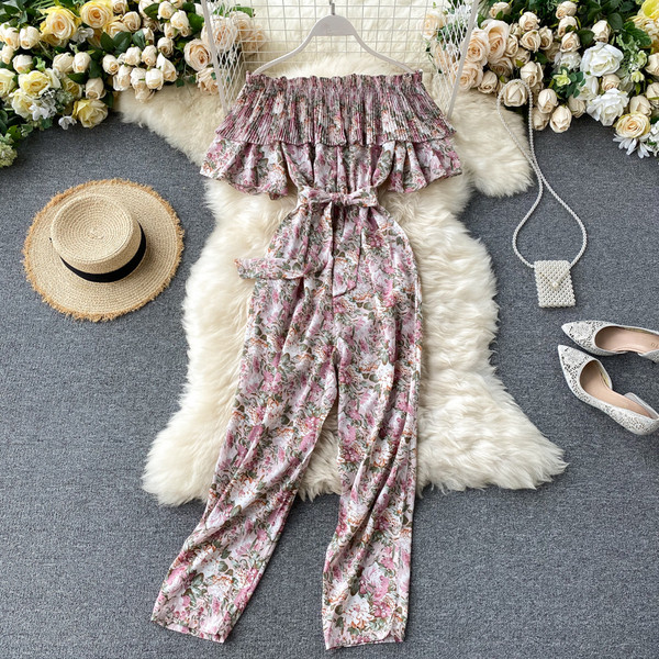 Μακριά γυναικεία ολόσωμη φόρμα με λουλουδάτο μοτίβο και ζώνη μέσης