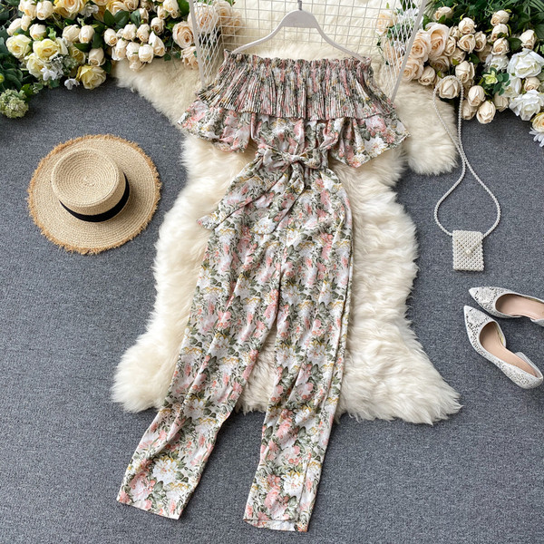 Μακριά γυναικεία ολόσωμη φόρμα με λουλουδάτο μοτίβο και ζώνη μέσης