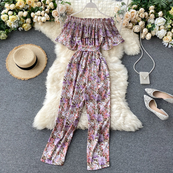 Μακριά γυναικεία ολόσωμη φόρμα με λουλουδάτο μοτίβο και ζώνη μέσης