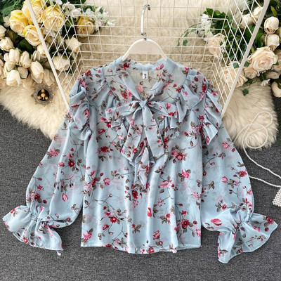 Modern női ing szalaggal és virágmintával