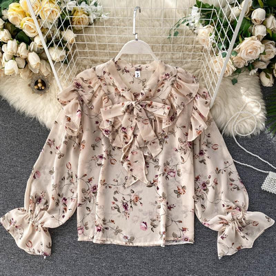 Modern női ing szalaggal és virágmintával