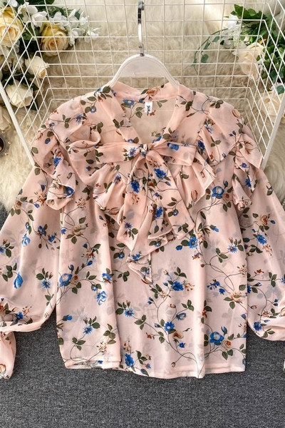 Modern női ing szalaggal és virágmintával