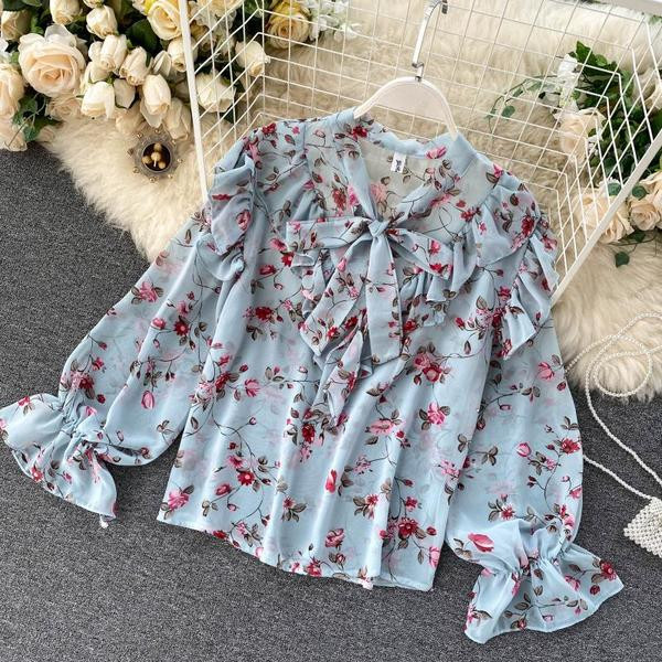 Modern női ing szalaggal és virágmintával