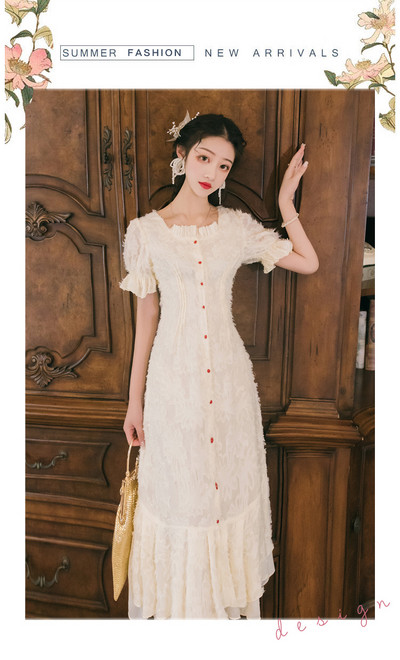 Κομψό γυναικείο φόρεμα με κουμπιά και οβάλ ντεκολτέ - κομμένο μοντέλο