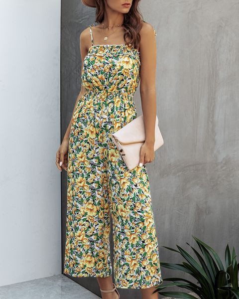 Lezser női hosszú, széles overall vékony pánttal, virágmintával