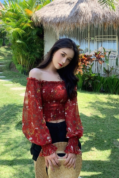 Női blúz csupasz váll és széles ujjú