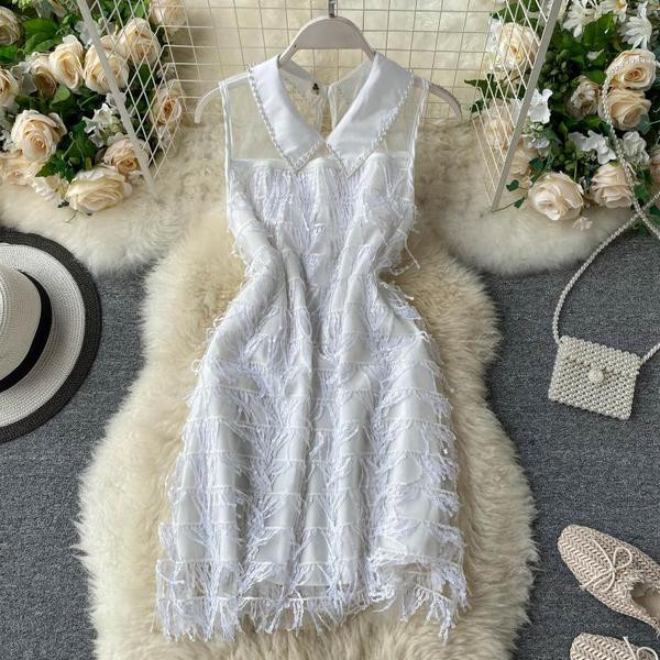 Moderna ženska haljina sa klasičnom kragnom i šljokicama