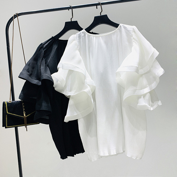 Új modell női blúz széles ujjal és kerek nyakkivágással