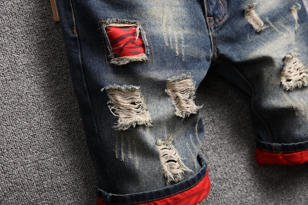 Lezser 3/4-es férfi farmer, szakadt motívummal és zsebekkel