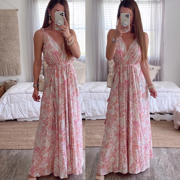 Modern női hosszú ruha modell, mély nyakkivágással és pántokkal