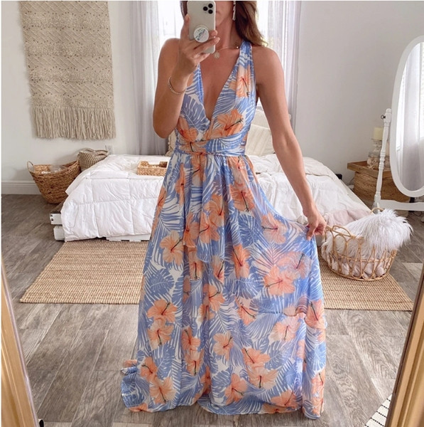 ΝΕΟ μοντέλο γυναικείο μακρύ φόρεμα με μακρύ ντεκολτέ και λουλουδάτο μοτίβο