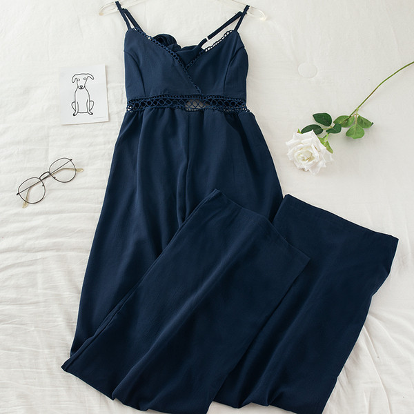 Μακριά γυναικεία ολόσωμη  φόρμα με ιμάντες και λαιμόκοψη