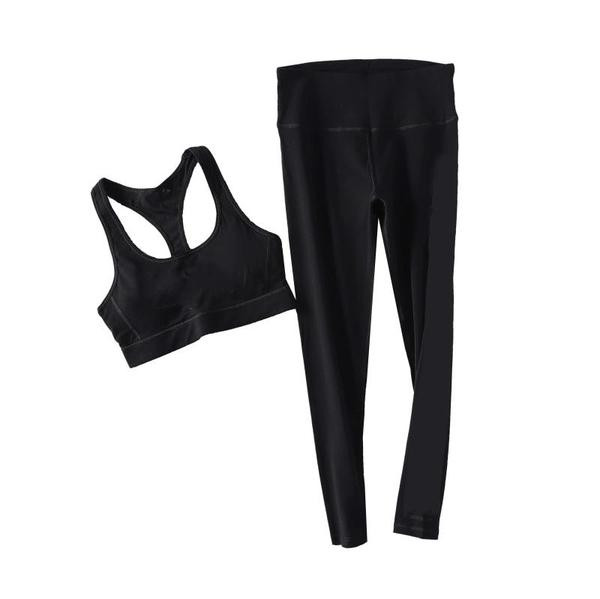 Spordikomplekt pikkadest mustadest retuusidest ja rinnakatest