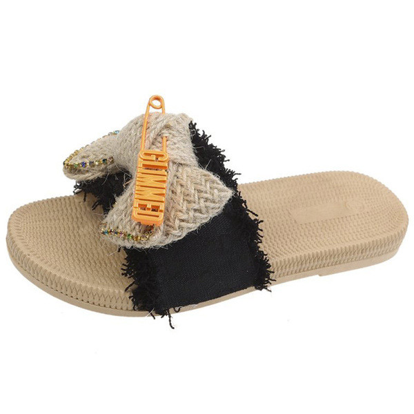 Γυναικείες παντόφλες με επίπεδη σόλα και κορδέλα