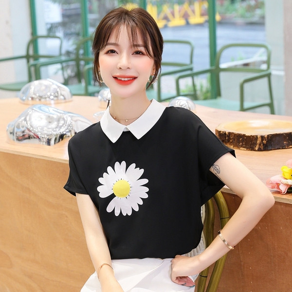 Νέα γυναικεία μπλούζα με στρογγυλή λαιμόκοψη και λουλούδι