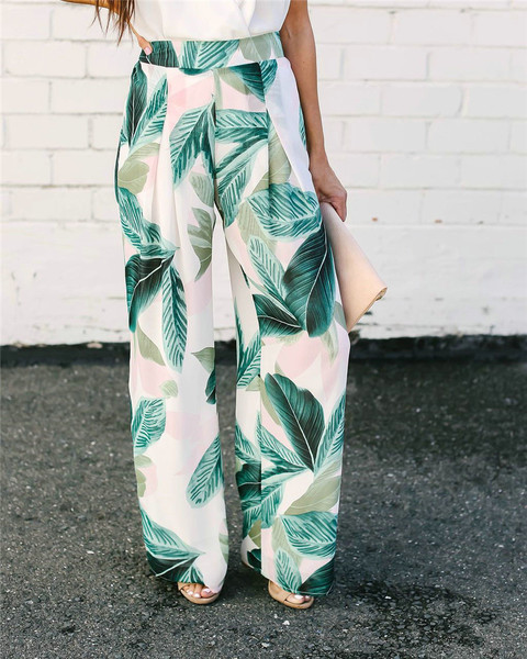 Modern női nadrág magas derékkal, virágmintával