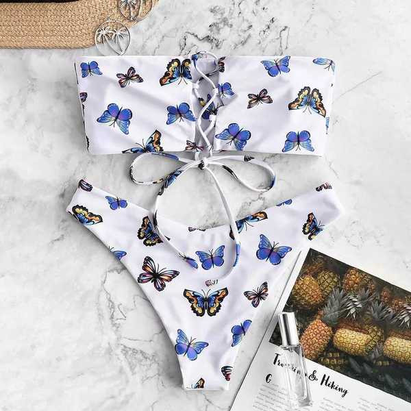 Liblikatega ujumistrikoo ja ristsidemetega paeltops