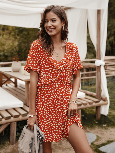 Modern rövid női jumpsuit spitz nyakkivágással és rövid ujjakkal