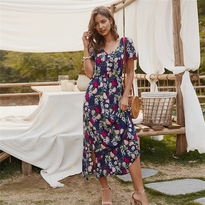 Rochie de dama colorata cu decolteu spitz si model floral