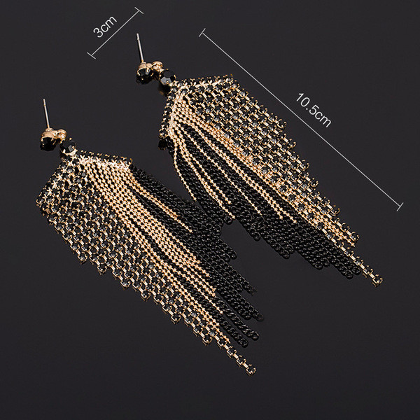 Κομψά γυναικεία σκουλαρίκια που κρέμονται με μαύρες και χρυσές πέτρες