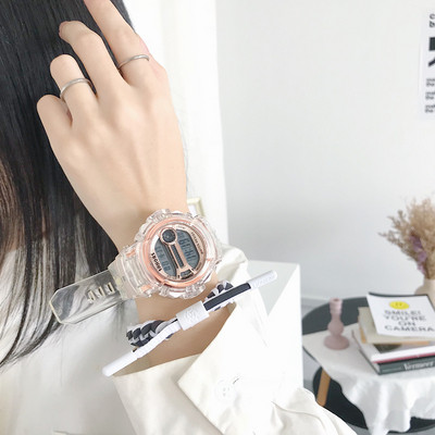 Női elektronikus átlátszó óra kerek formában