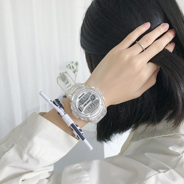 Női elektronikus átlátszó óra kerek formában