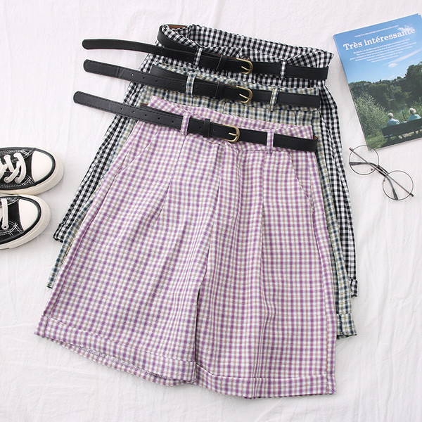 Moodsad ruudulised naiste püksid koos vööga