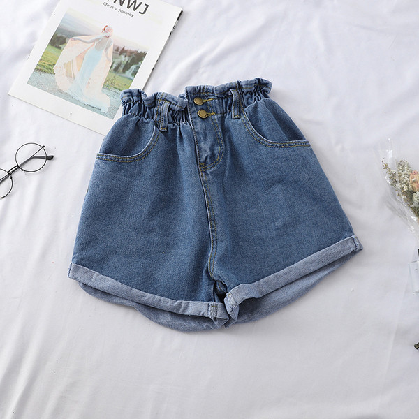 Naiste lühikesed kõrge vöökoha ja kummiga teksad