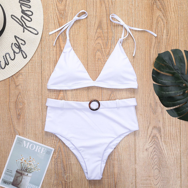 Naiste kaheosalised musta värvi ja kõrge vöökohaga püksid